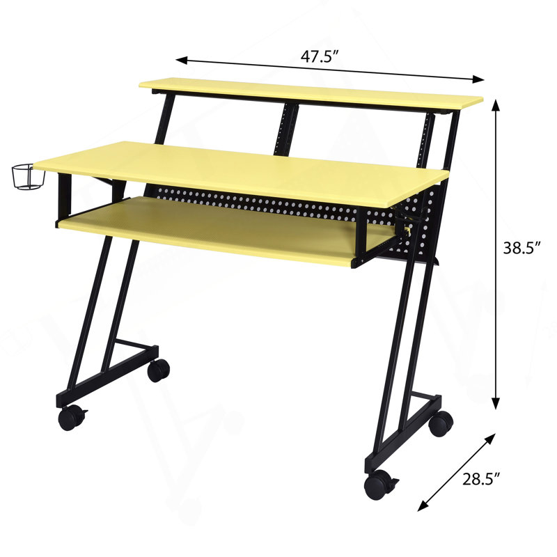 Bureau de studio de musique jaune et noir avec plateau à clavier