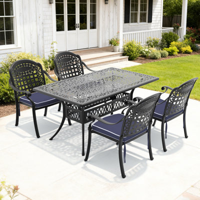 Ensemble de 5 chaises de jardin en aluminium moulé, structure noire, coussins d'assise bleus, fabrication artisanale, jolis motifs, revêtement, confortables, empilables, tissu résistant aux intempéries, pieds antibruit
