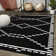 Tapis noir à motif géométrique Krantz