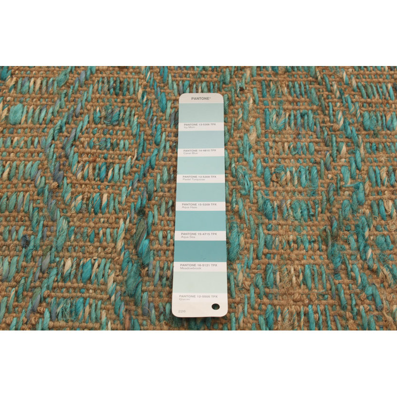 Tapis turquoise à tissage plat Kalos