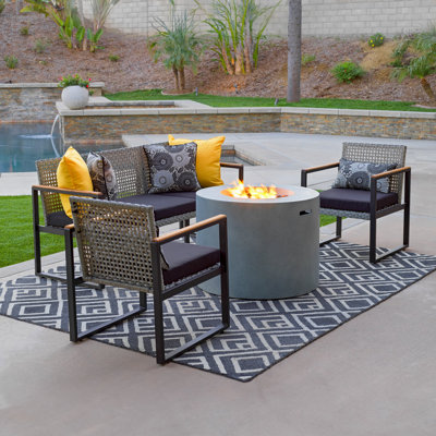5-Piece Wicker Conversation Set with Round Alloy Steel Fire Pit. Comes with Black Cushion