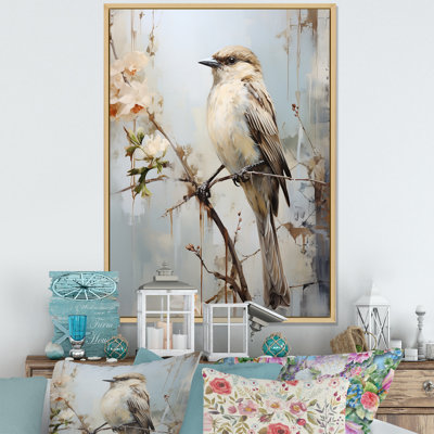Minimalisme, oiseau beige sur une branche
