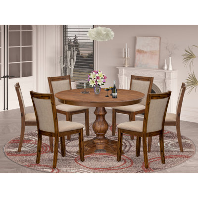 L'ensemble de salle à manger 7 pièces se compose d'une table de salle à manger à piédestal et de 6 chaises rembourrées en lin brun clair avec dossier rembourré - finition noyer antique