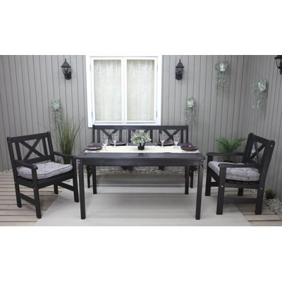 Destry 5 - Person Wood Patio Dining Set with Rectangular Table , Cushions Included