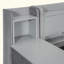 Lit de jour rembourré avec tiroirs, tablettes, armoires rabattables et table d'appoint