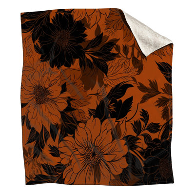 Couvertures florales orange et noires