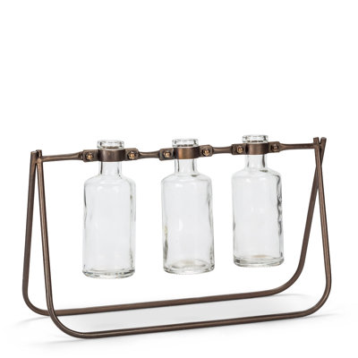 Triple bouteilles dans un vase pivotant