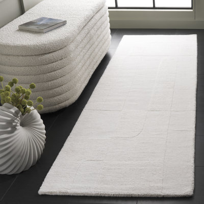 Kyrie Solid Color Hand Loomed Wool/Cotton Area Rug in Ivory
