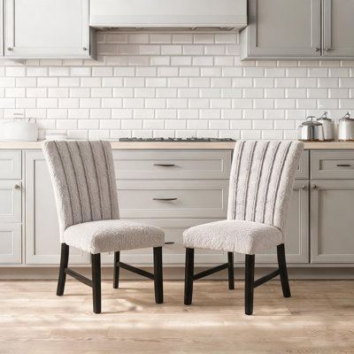 Chaises de salle à manger rembourrées Boucle avec plis verticaux et pieds en bois massif noir Boucle, ensemble de 2