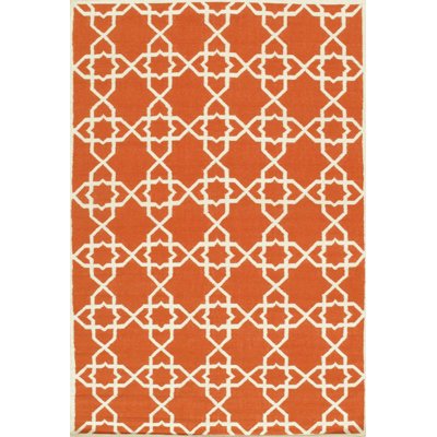 Tapis orange / ivoire en laine tissé à la main à motif géométrique