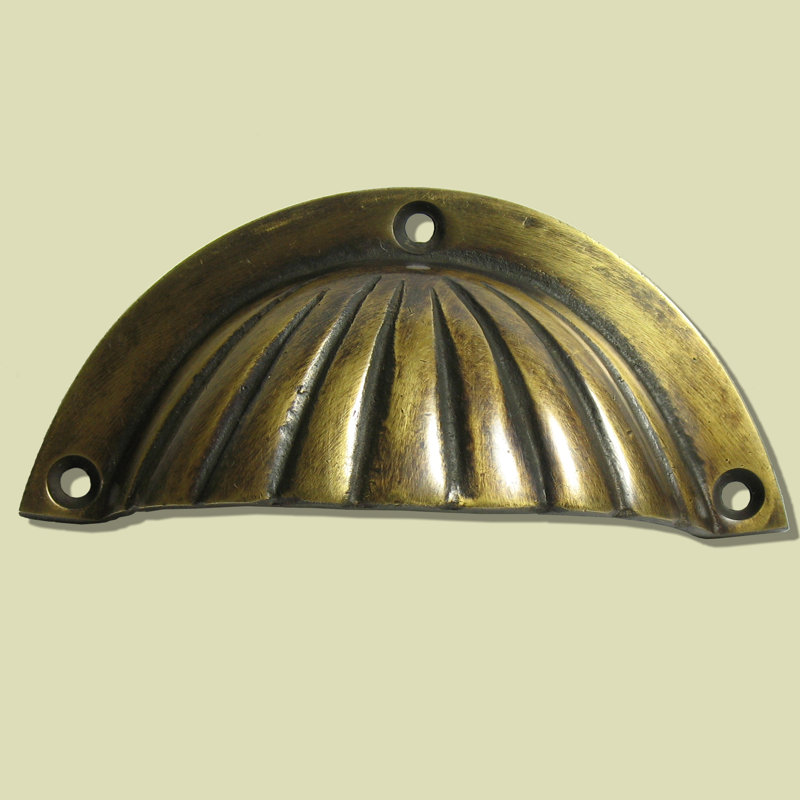 Poignée coquille Clamshell