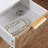 Nightstand With 3 Drawers, Mid-Century Modern End Table,Gold Metalfeet, Gold Metal Handles , Drawer Panels Are Shaped By Cutting Lines,End Table For Bedroom,White And Natural