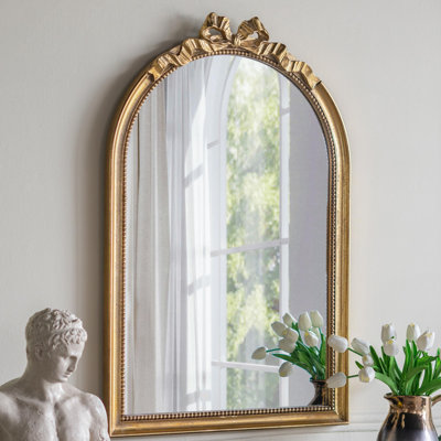 Miroir arqué de style baroque