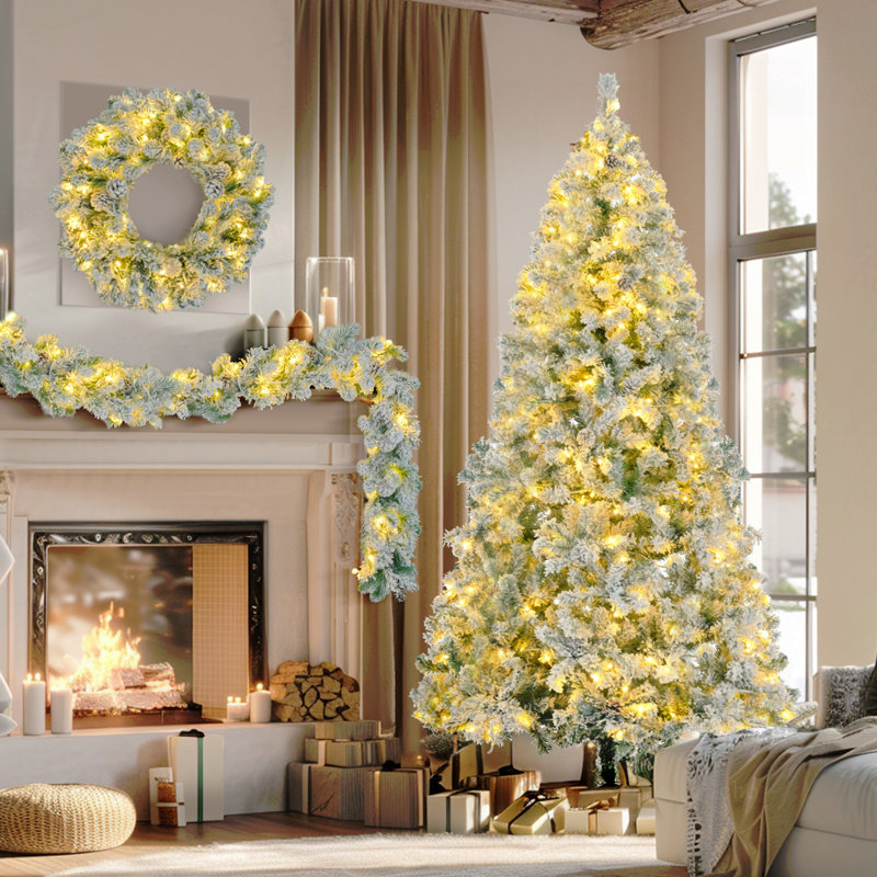 Arbre de Noël enneigé 6 pi, ensemble illuminé avec arbre, guirlande et couronne, arbre de Noël articulé artificiel avec lumières DEL colorées, 8 modes d'éclairage, pommes de pin, décoration des Fêtes pour la maison