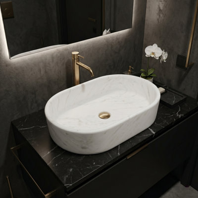Lavabo ovale en marbre au design élégant pour une esthétique de salle de bain luxueuse
