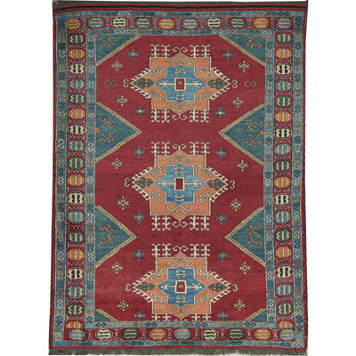 Tapis rouge noué à la main de haute qualité