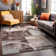 Bionda Geometric Machine Woven Polypropylene Area Rug in Brown