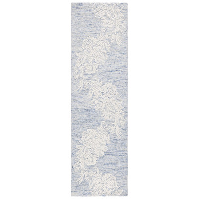 Tapis floral ivoire / bleu en laine / coton touffeté à la main Batholomew