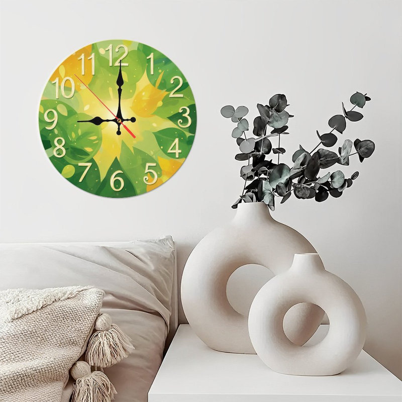Horloge avec feuilles vertes et soleil