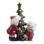 Statue d'enfant avec un sapin de NoÃ«l illuminÃ©