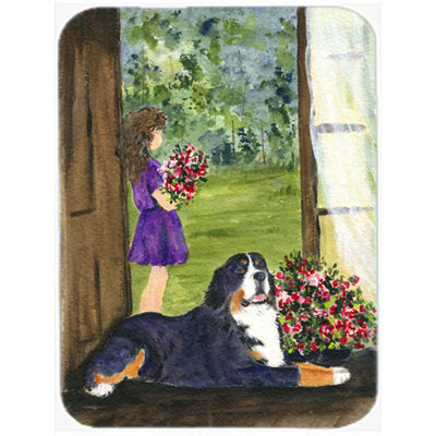East Urban Home Little Girl with Her Bernese Mountain Dog Rectangle Glass Cutting Board