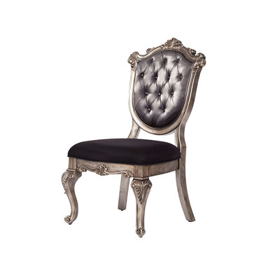 Chaise de salle à manger vintage en argent sculpté avec revêtement capitonné à boutons noirs