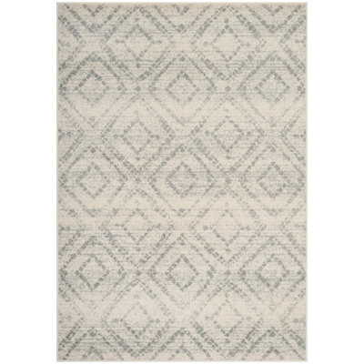 Muniz Geometric Ivory/Light Blue Area Rug