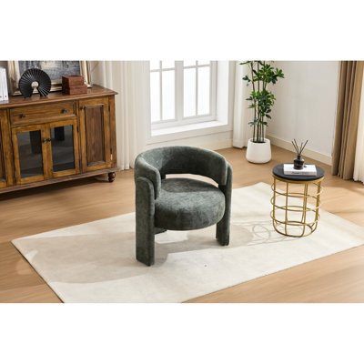 Fauteuil d'appoint confortable, recouvert d'un tissu bouclé contemporain, aux lignes cylindriques harmonieuses et offert en plusieurs coloris. Revêtement en tissu pour fauteuil - Design et confort d'assise.