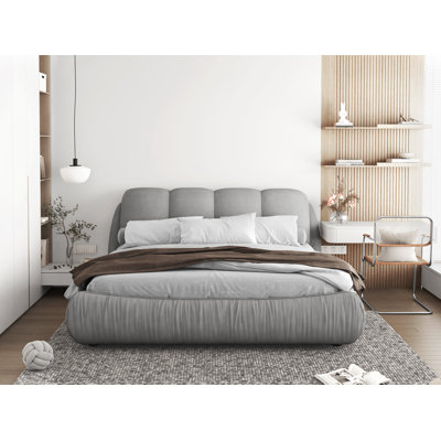 Henness Upholstered Sleigh Bed