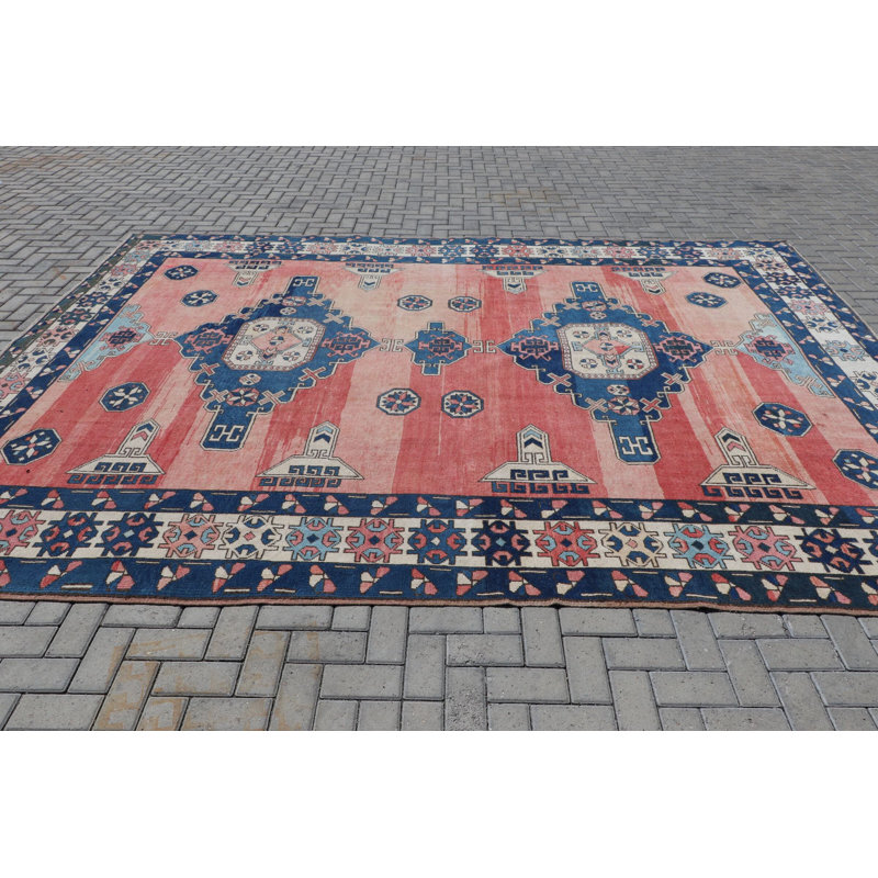 Tapis turc en laine fabriqué à la main avec un motif ethnique idéal pour les espaces surdimensionnés