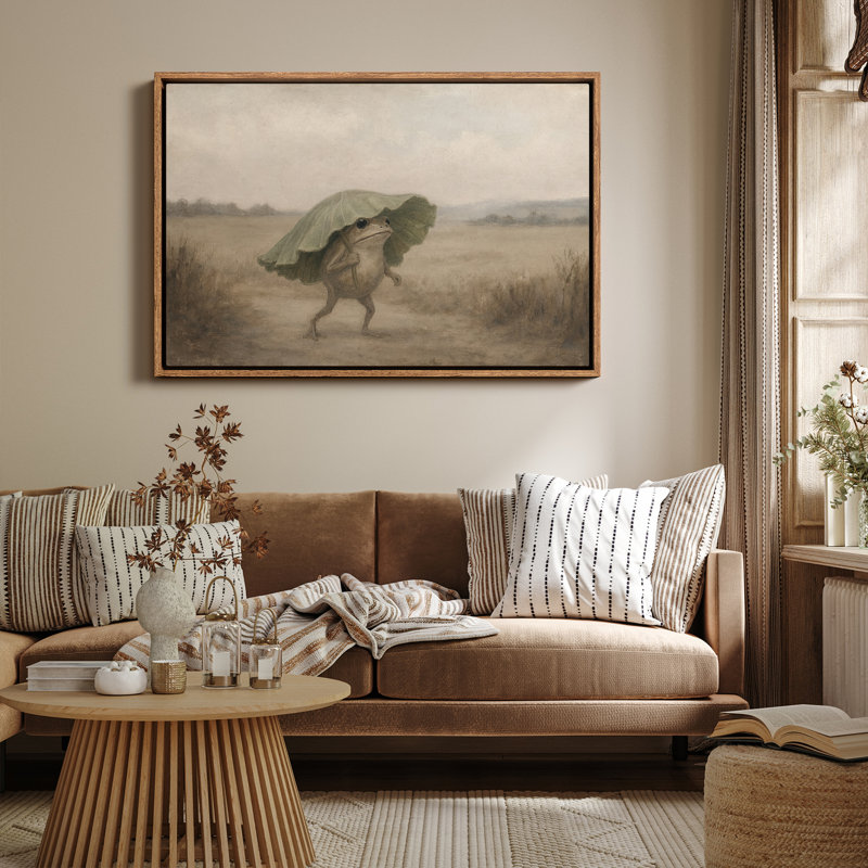 «Whimsical Frog Walking with Leaf Umbrella in Dreamy Countryside», reproduction d'art encadrée, H 16 po x l 24 po, Naturel
