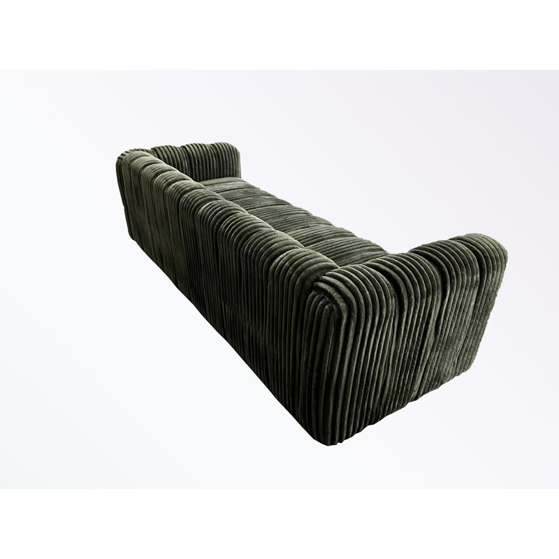 corduroy sofa with pillows and sturdy legs, Green