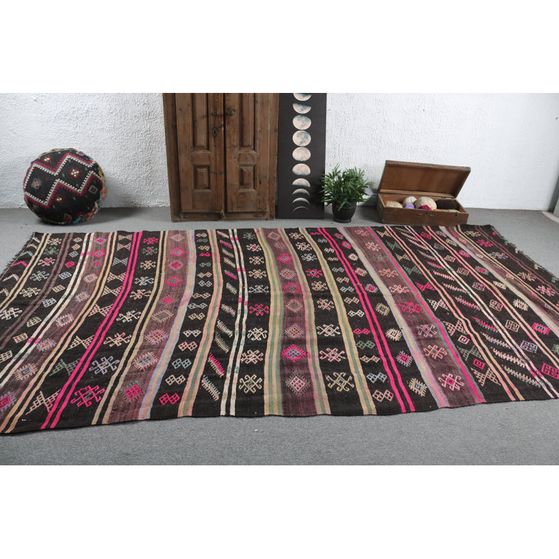 Vintage Turkish Black Kilim Rug Offers a Bohemian Touch with Handmade Patterns and Details