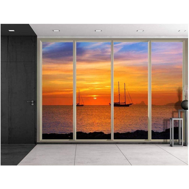 Coucher de soleil sur l'océan alors que des bateaux naviguent près des rochers, L 100 po x l 144 po
