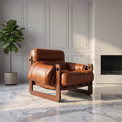Fauteuil lounge en cuir de style milieu du siècle avec coussin amovible, idéal pour le salon, la chambre ou la salle de lecture.