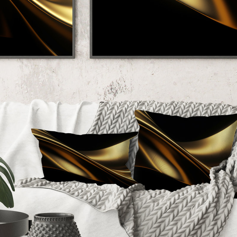 Coussin doré et noir