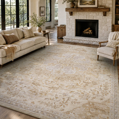 Tapis oriental beige délavé doux à motif floral délavé