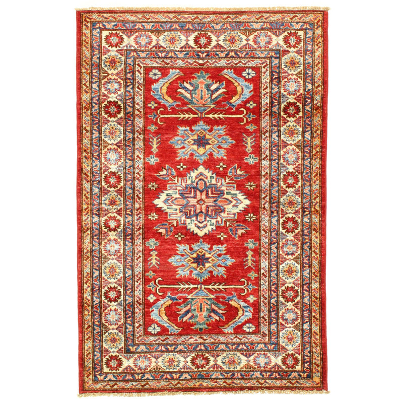 Lovall Wool Oriental Area Rug in Rust