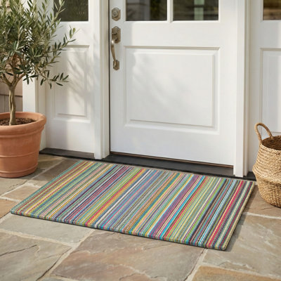 Tapis d'extérieur en plastique imperméable Ammie Candy