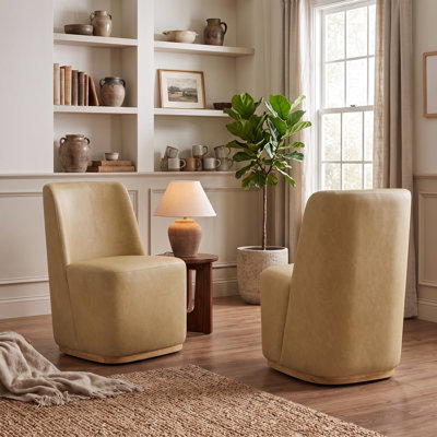 Chaise de salle à manger rembourrée avec roulettes Geelt