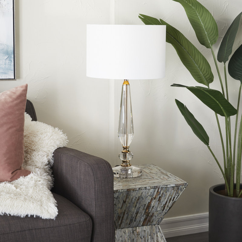 Lampe de cristal transparent avec accents dorés
