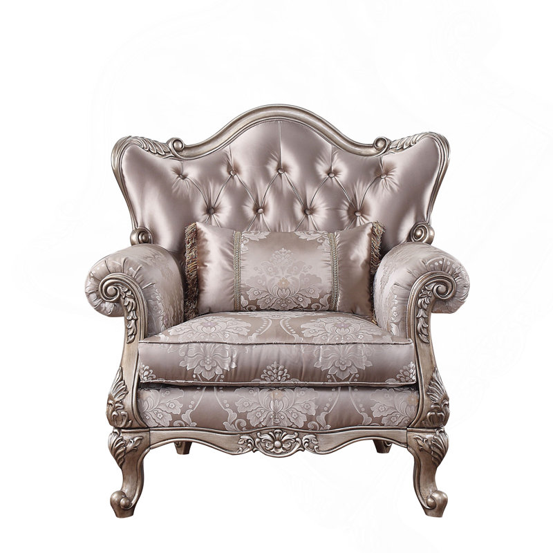 Chaise en tissu et champagne avec coussin