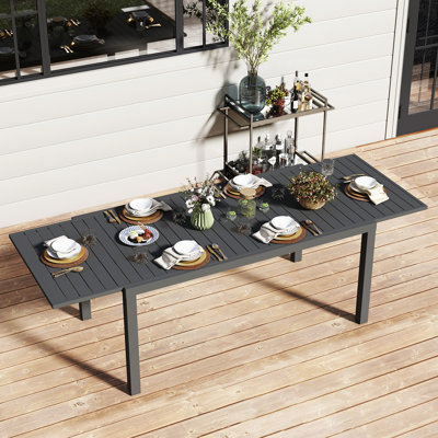 97.2"L Extendable Aluminum Outdoor Dining Table by Latitude Run