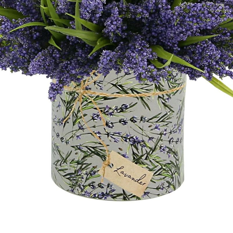 Heather Arrangement In A Glass Vase With Lavender Label