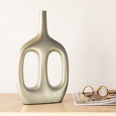 Modern Aluminum Metal Vase with Sculptural Openwork Design.