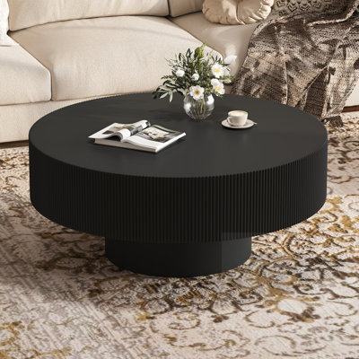 Table basse ronde avec plateau épais
