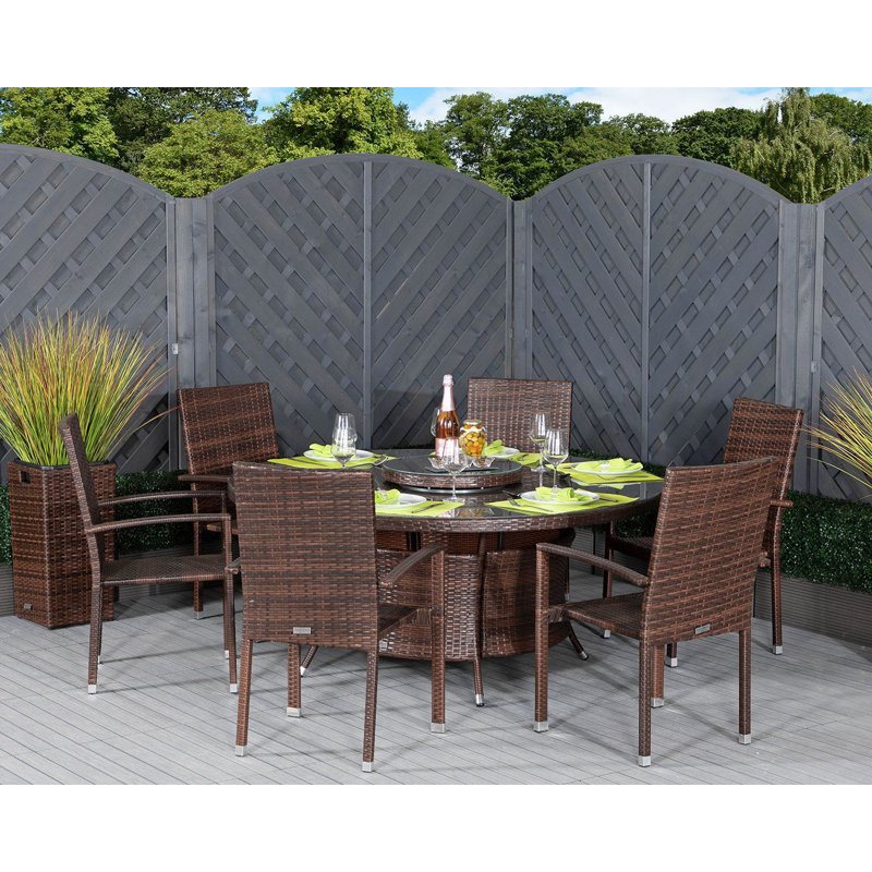 Faust 6 - Person Patio Dining Set with Round Table , Cushions Included