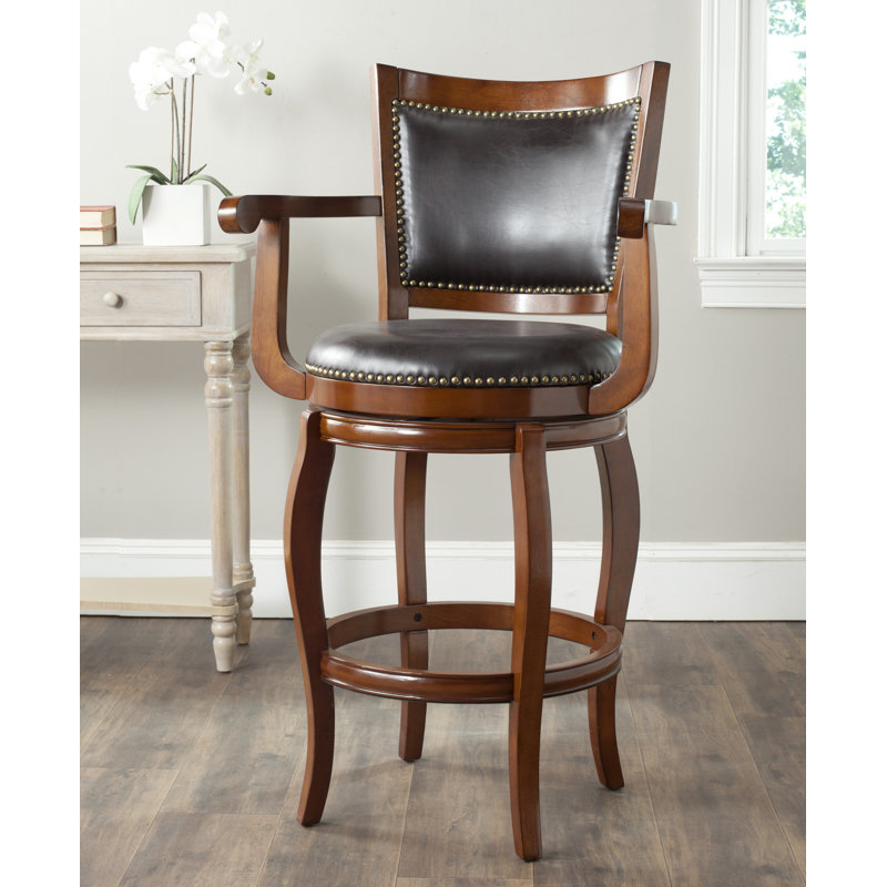 Confortable fauteuil de comptoir pivotant Aare - siège en bois d'hévéa et cuir écologique et garniture cloutée pour la maison