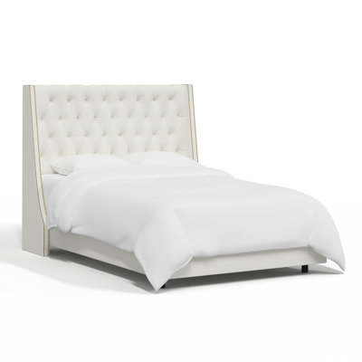 Avala Upholstered Wingback Bed