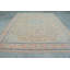 Grand tapis turc avec motif floral rétro dans des couleurs pastel douces et élégant beige et bleu pour le décor du salon